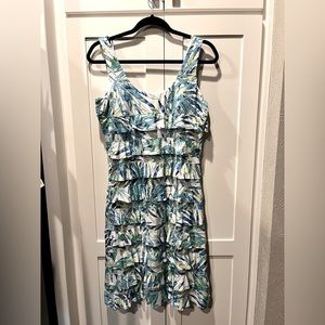 Never Worn! New ruffled sundress.  Very flattering with high quality fabric.